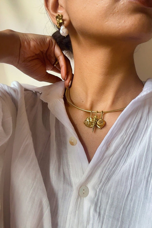 Perirhoe Shell Charm