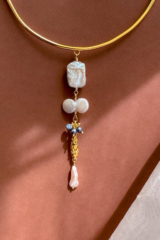 Choker with pearl & Fish Charm displayed on a neutral background