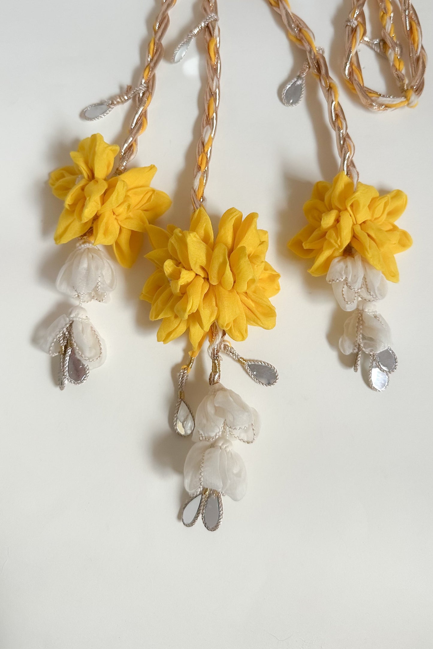 Parandi with yellow & ivory  flowers with mirror hangings  on a white background