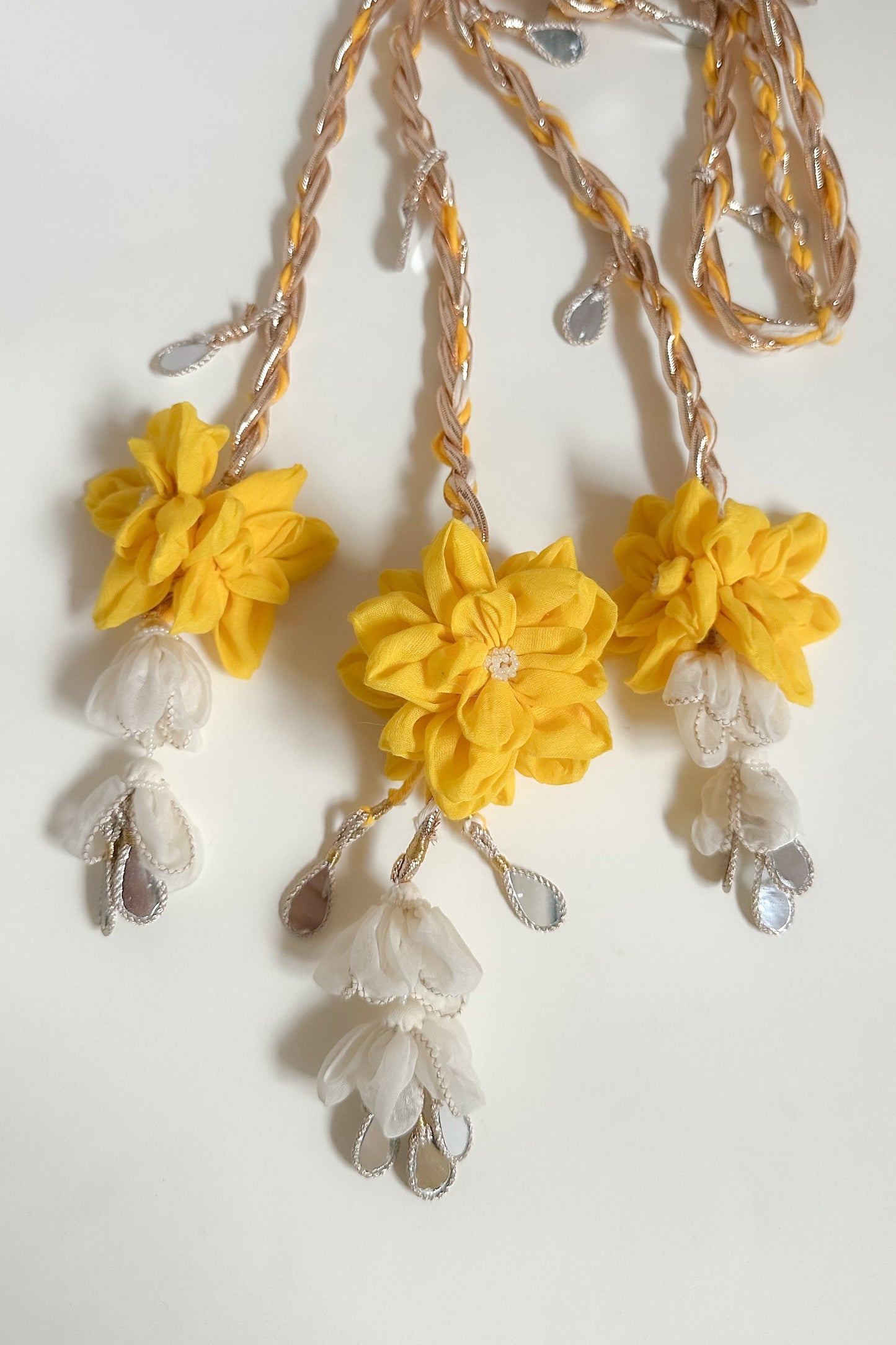 Parandi with yellow & ivory  flowers with mirror hangings  on a white background