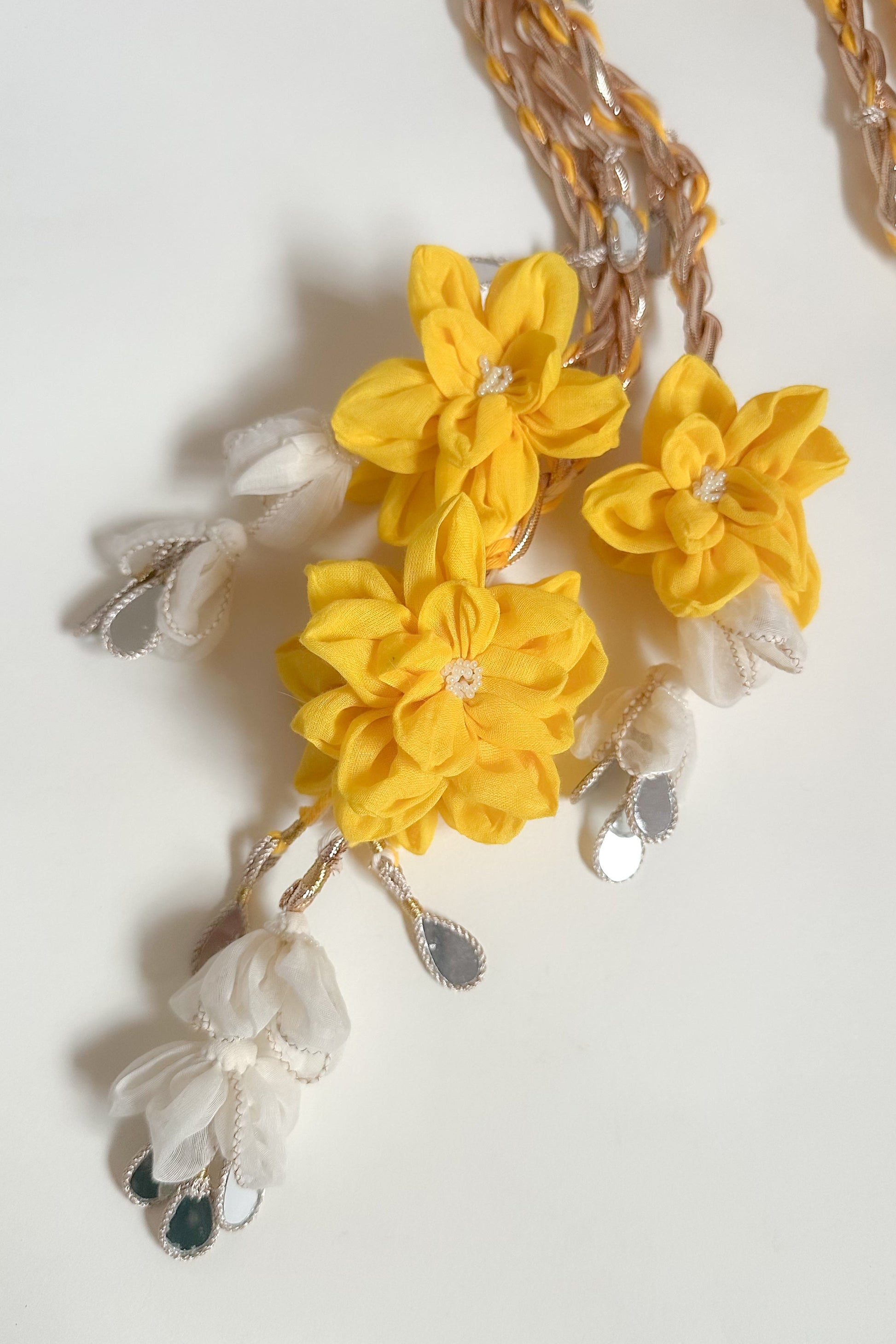 Parandi with yellow & ivory  flowers with mirror hangings  on a white background