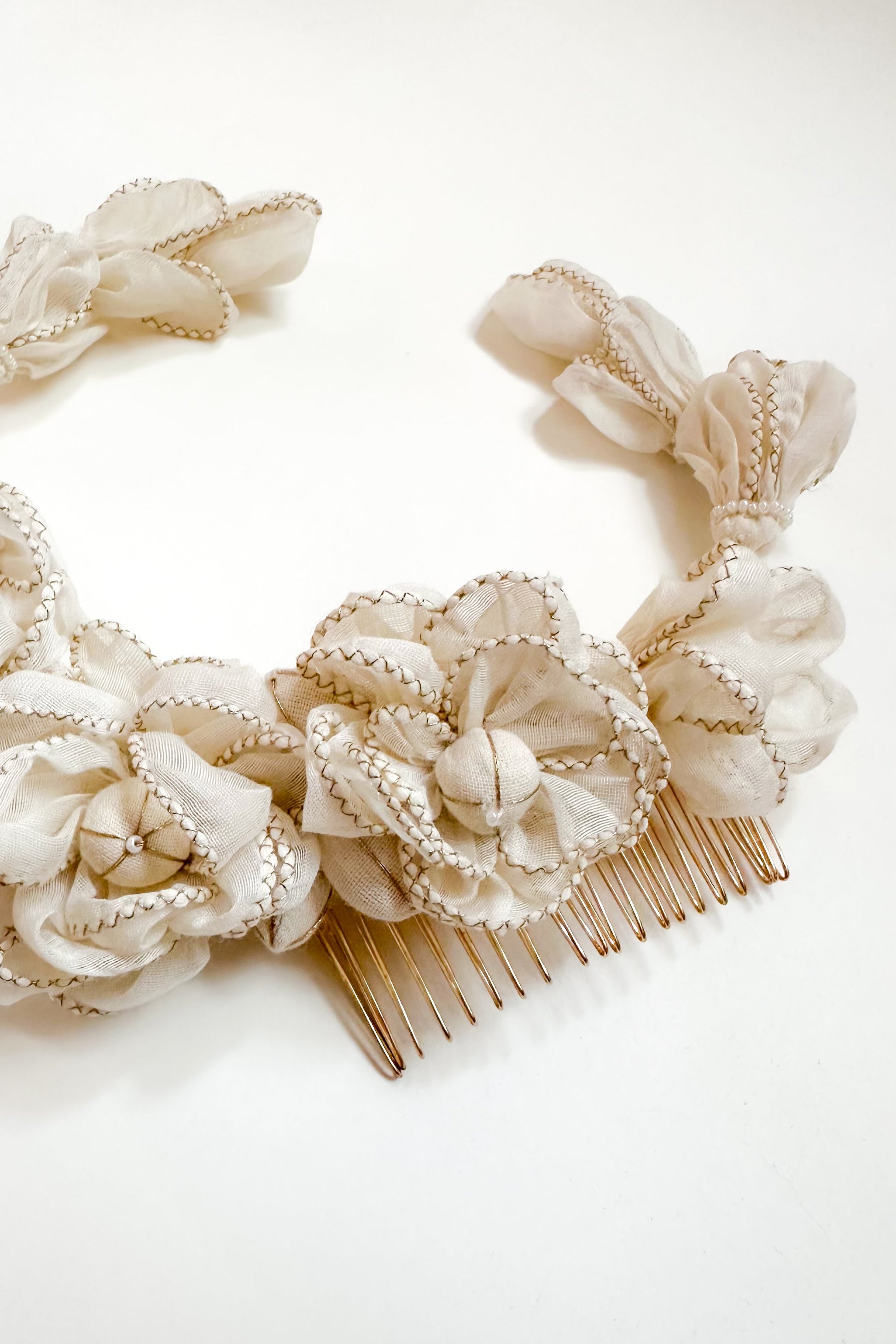 Decorative hair comb with floral elements on a white background
